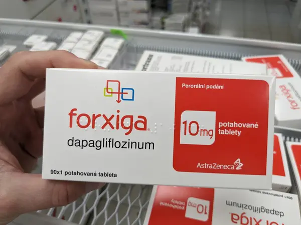 stock image Prague, Czech Republic - July 10 2024: FORXIGA box of medication with DAPAGLIFLOZIN active substance by ASTRAZENECA, used for treatment of type 2 diabetes and heart failure.