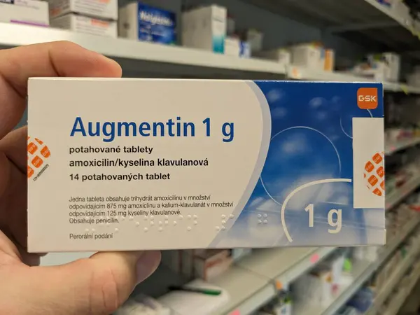 stock image Prague, Czech Republic - July 10 2024: AUGMENTIN box of medication with AMOXICILLIN and CLAVULANIC ACID active substances by GLAXOSMITHKLINE, used for treatment of bacterial infections.