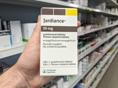 Prague, Czech Republic -August 6, 2024: JARDIANCE tablets with EMPAGLIFLOZIN active substance by BOEHRINGER INGELHEIM, used for diabetes management. clipart