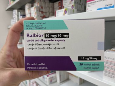 Prague, Czech Republic-August 10 2024: RALIBOR box of tablets with RAMIPRIL and BISOPROLOL active substances, used for treatment of hypertension, heart failure, cardiovascular health. clipart