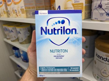 Prague,Czech Republic-August 7 2024: NUTRILON NUTRITON box of infant formula thickener by NUTRICIA,used for anti-regurgitation infant care clipart