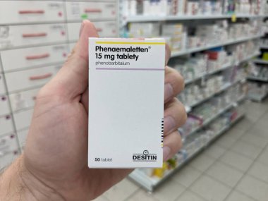 Prague,Czech Republic-August 7 2024: PHENAEMALETTEN box of medication with PHENOBARBITAL active substance by DESITIN,used for treatment of epilepsy,seizures. clipart