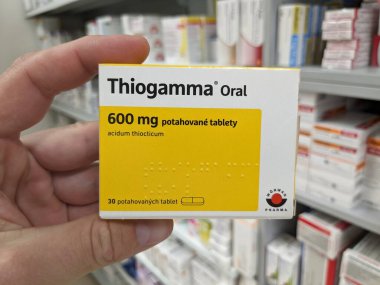 Prague,Czech Republic-August 10 2024: THIOGAMMA ORAL box of medication with ALPHA-LIPOIC ACID active substance by WRWAG PHARMA,used for treatment of diabetic neuropathy,neuroprotection. clipart