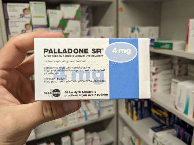 Prague,Czech Republic-August 10 2024: PALLADONE SR box of extended-release tablets with HYDROMORPHONE active substance,used for treatment of severe chronic pain. clipart