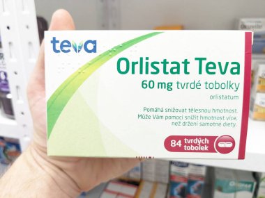 Prag, Çek Cumhuriyeti - 13 Temmuz 2024: ORLISTAT TEVA kapsülleri ve TEVA tarafından aktif madde, kilo kaybı ve obezite tedavisi için kullanılır.