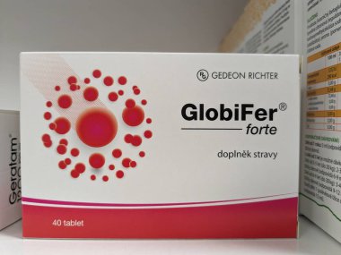 Prague, Czech Republic - July 13, 2024: GLOBIFER FORTE tablets with HEME IRON active substance by FERROSAN, used as an iron supplement for anemia support. clipart