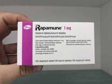 Prague, Czech Republic - July 9 2024: RAPAMUNE tablets with SIROLIMUS active substance by PFIZER, used for immunosuppression in organ transplants. clipart