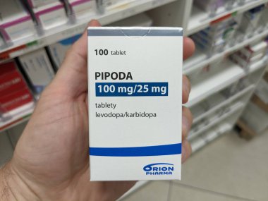 Prague, Czech Republic - July 13, 2024: PIPODA-LEVODOPA KARBIDOPA tablets with LEVODOPA and CARBIDOPA active substances by TEVA, used for Parkinson's disease treatment. clipart