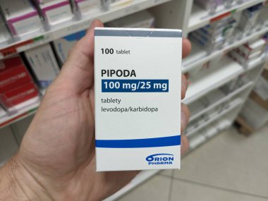 Prague, Czech Republic - July 13, 2024: PIPODA-LEVODOPA KARBIDOPA tablets with LEVODOPA and CARBIDOPA active substances by TEVA, used for Parkinson's disease treatment. clipart