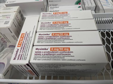 Prag, Çek Cumhuriyeti - 9 Temmuz 2024: OREXIGEN THERAPEUTICS tarafından kullanılan NALTREXone ve BUPROPION aktif maddeleri içeren MYSIMBA tabletleri.