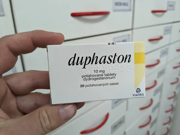 stock image Prague,Czech Republic-August 10 2024: DUPHASTON box of medication with DYDROGESTERONE active substance,used for treatment of menstrual disorders,pregnancy support.