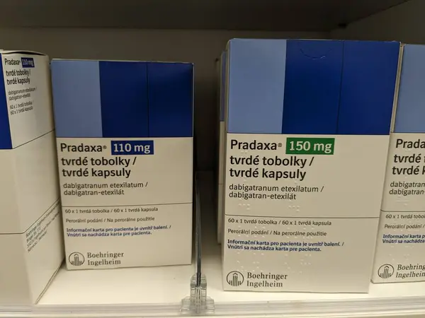 Stock image Prague, Czech Republic - June 28, 2024: PRADAXA box of medication with dabigatran active substance by Boehringer Ingelheim, used for treatment of blood clot prevention, stroke, atrial fibrillation.