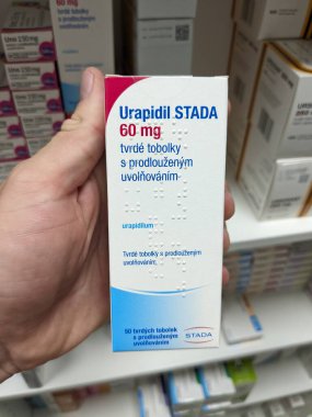 Prague, Czech Republic - July 13, 2024: URAPIDIL STADA injection with URAPIDIL active substance by STADA, used for hypertension treatment. clipart