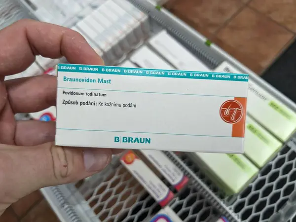 stock image Prague, Czech Republic - July 9 2024: BRAUNOVIDON box of ointment with POVIDONE-IODINE active substance by B. BRAUN, used for treatment of wound care and infection prevention.