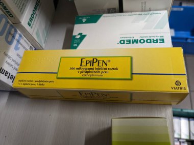 Prague, Czech Republic-August 28 2024:EPIPEN box of medication with epinephrine active substance by Mylan, used for treatment of anaphylaxis, severe allergic reactions, anaphylactic shock. clipart