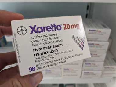 Prague, Czech Republic-August 15 2024: XARELTO box of tablets with RIVAROXABAN active substance by BAYER, used for the prevention and treatment of blood clots and stroke. clipart