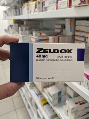 Prague,Czech republic-June 17 2024: Zeldox box of medication with Ziprasidone active substance by Pfizer,used for treatment of schizophrenia, bipolar disorder clipart