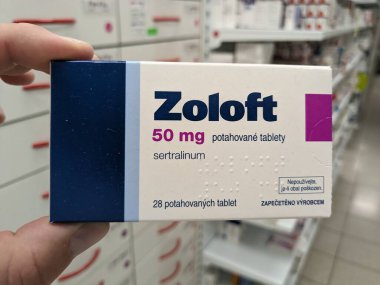 Prague, Czech Republic - August 28 2024: ZOLOFT box with SERTRALINE active substance by PFIZER, used for treatment of depression, anxiety, and OCD. clipart