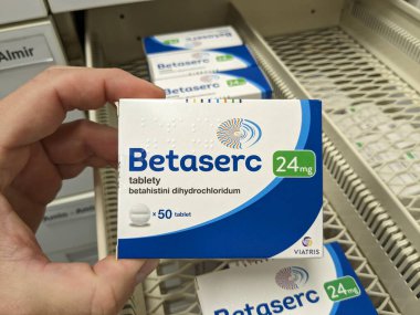 Prague, Czech Republic - July 10 2024: BETASERC box of medication with BETAHISTINE active substance by VIATRIS, used for treatment of vertigo and Meniere's disease. clipart