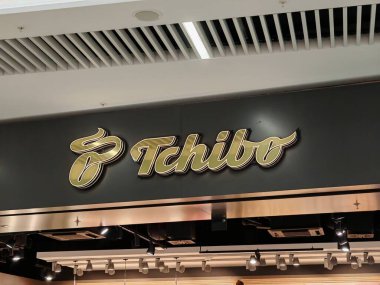 Prague, Czech Republic - SEPTEMBER 13 2024: TCHIBO retail store by TCHIBO, known for selling coffee, clothing, home goods, and lifestyle products in an ever-changing selection. clipart