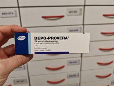 Prague, Czech Republic - July 9 2024: DEPO-PROVERA box of medication with medroxyprogesterone acetate active substance by Pfizer, used for treatment of contraception, menstrual disorders, endometriosi clipart