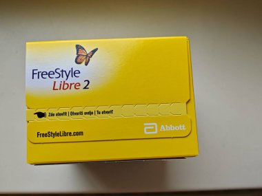 Prague,Czech Republic-October 9 2024: FreeStyle Libre 2 by ABBOTT is a continuous glucose monitoring system (CGM) designed for people with diabetes, providing real-time glucose readings and management clipart