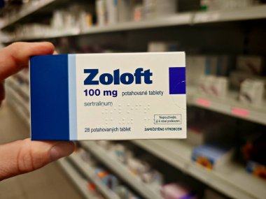 Prague, Czech Republic - August 28 2024: ZOLOFT box with SERTRALINE active substance by PFIZER, used for treatment of depression, anxiety, and OCD. clipart