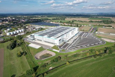 KOJETIN,Czech republic-September 24 2022:Brand new Amazon Warehouse distribution center. Aerial view of massive sort and distribute logistics center,Eur Amazon warehouse,Kojetin Czech solar powerplant clipart