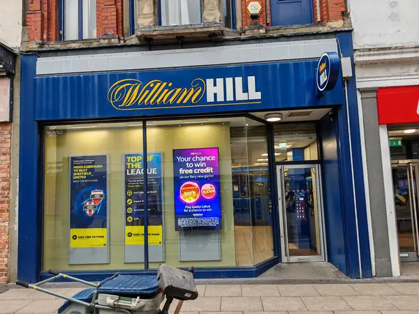 Londra, İngiltere-5 Mart 2025: WILLIAM Hill, İngiltere 'de online ve perakende spor bahisleri, kumarhane oyunları ve poker turnuvaları düzenleyen ünlü bir bahisçidir.