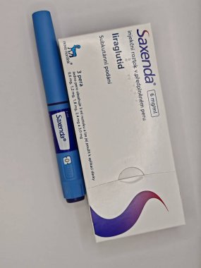 Prag, Çek Cumhuriyeti - 2 Ağustos 2024: NOVO NORDISK tarafından kullanılan LIRAGLUTIDE aktif maddeyle SAXENDA ilaç kutusu.