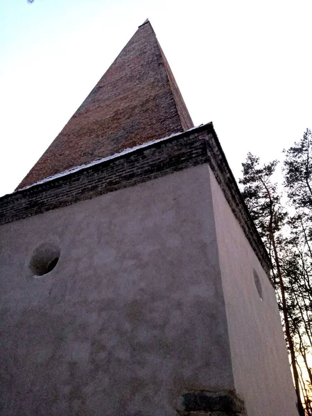 Arians tower (post renovation)  known also as Grobisko, XVII century pyramidal tower- tomb of Pawe Orzechowski lord of Krupe castle. Who do to his unitarian faith could not be buried on catholic or protestant cementary. Winter february 2023