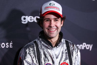 Slovakian YouTuber David Dobrik arrives at Darren Dzienciol's CARN*EVIL Halloween Party hosted by Alessandra Ambrosio held at a Private Residence on October 29, 2022 in Bel Air, Los Angeles, California, United States.  clipart
