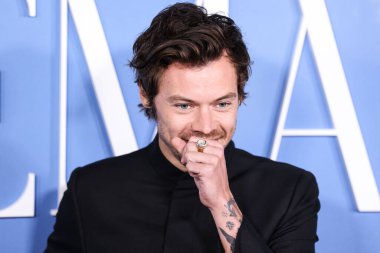 English singer, songwriter and actor Harry Styles wearing a Gucci suit arrives at the Los Angeles Premiere Of Amazon Prime Video's 'My Policeman' held at the Regency Bruin Theatre on November 1, 2022 in Westwood, Los Angeles, California, United State