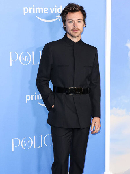 English singer, songwriter and actor Harry Styles wearing a Gucci suit arrives at the Los Angeles Premiere Of Amazon Prime Video's 'My Policeman' held at the Regency Bruin Theatre on November 1, 2022 in Westwood, Los Angeles, California, United State