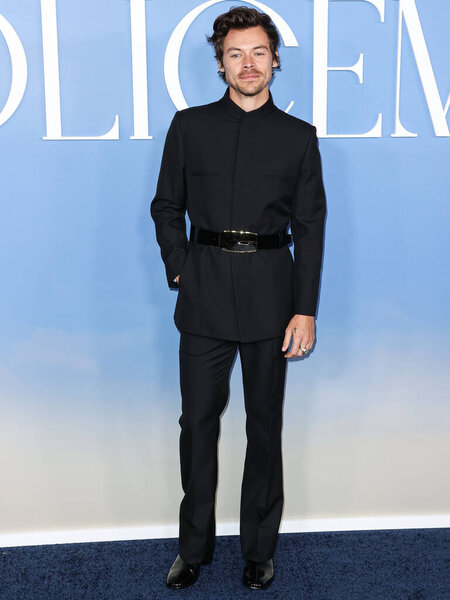 English singer, songwriter and actor Harry Styles wearing a Gucci suit arrives at the Los Angeles Premiere Of Amazon Prime Video's 'My Policeman' held at the Regency Bruin Theatre on November 1, 2022 in Westwood, Los Angeles, California, United State