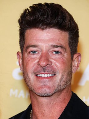 Robin Thicke, Los Angeles 2022 amfAR galasına 3 Kasım 2022 'de Batı Hollywood, Los Angeles, ABD' deki Pasifik Tasarım Merkezi 'nde ulaştı.. 