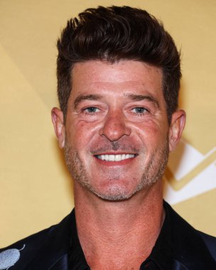 Robin Thicke, Los Angeles 2022 amfAR galasına 3 Kasım 2022 'de Batı Hollywood, Los Angeles, ABD' deki Pasifik Tasarım Merkezi 'nde ulaştı.. 