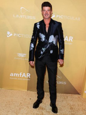 Robin Thicke, Los Angeles 2022 amfAR galasına 3 Kasım 2022 'de Batı Hollywood, Los Angeles, ABD' deki Pasifik Tasarım Merkezi 'nde ulaştı.. 