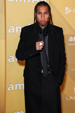 Tyga, 3 Kasım 2022 tarihinde Los Angeles Pasifik Tasarım Merkezi 'nde düzenlenen 2022 amfAR Galası' na ulaşır.. 
