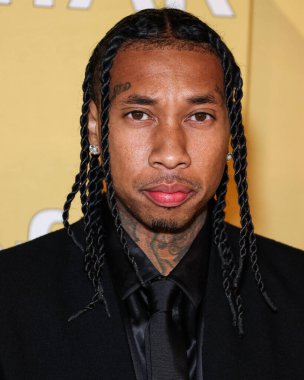 Tyga, 3 Kasım 2022 tarihinde Los Angeles Pasifik Tasarım Merkezi 'nde düzenlenen 2022 amfAR Galası' na ulaşır.. 