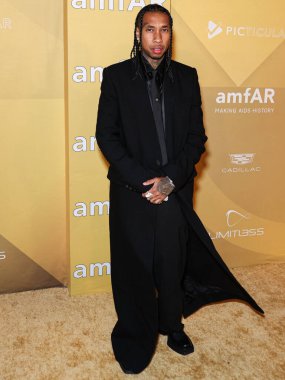 Tyga, 3 Kasım 2022 tarihinde Los Angeles Pasifik Tasarım Merkezi 'nde düzenlenen 2022 amfAR Galası' na ulaşır.. 