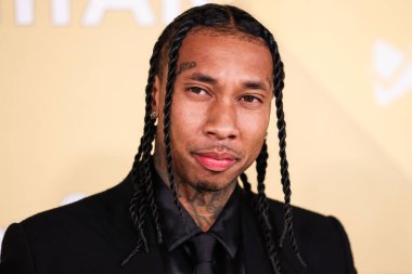 Tyga, 3 Kasım 2022 tarihinde Los Angeles Pasifik Tasarım Merkezi 'nde düzenlenen 2022 amfAR Galası' na ulaşır.. 