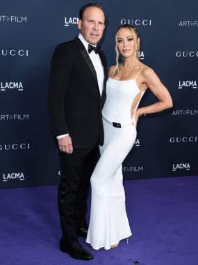 Dave Dollinger ve Tara Dollinger, Gucci 'nin 5 Kasım 2022' de Los Angeles Eyalet Sanat Müzesi 'nde sunduğu 11. LACMA Sanat ve Film Galası 2022' ye geldiler..
