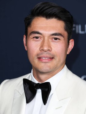 Henry Golding, 5 Kasım 2022 'de Los Angeles Eyalet Sanat Müzesi' nde düzenlenen Gucci tarafından sunulan 11. LACMA Sanat + Film Galası 'na geldi..