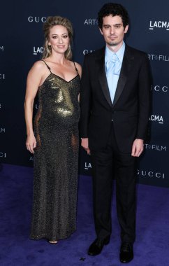 Olivia Hamilton ve kocası Damien Chazelle, 5 Kasım 2022 'de Los Angeles İlçe Sanat Müzesi' nde düzenlenen 11. LACMA Sanat + Film Galası 2022 'ye geldiler..