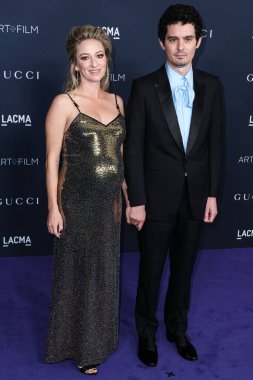 Olivia Hamilton ve kocası Damien Chazelle, 5 Kasım 2022 'de Los Angeles İlçe Sanat Müzesi' nde düzenlenen 11. LACMA Sanat + Film Galası 2022 'ye geldiler..