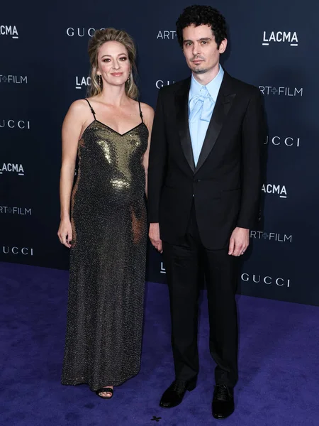 stock image Olivia Hamilton and husband Damien Chazelle arrive at the 11th Annual LACMA Art + Film Gala 2022 presented by Gucci held at the Los Angeles County Museum of Art on November 5, 2022 in Los Angeles, California, United States.