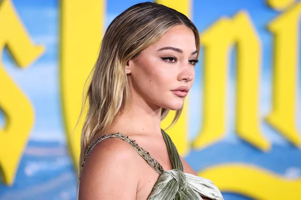 stock image actress  Madelyn Cline wearing an Atelier Versace dress and REZA jewelry arrives at the Los Angeles Premiere Of Netflix's 'Glass Onion: A Knives Out Mystery' held at the Academy Museum of Motion Pictures on November 14, 2022 in Los Angeles