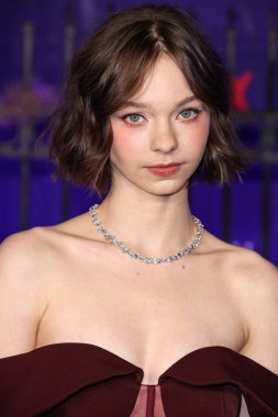 American actress Emma Myers arrives at the World Premiere Of Netflix's 'Wednesday' Season 1 held at the Hollywood American Legion Post 43 at Hollywood Legion Theater on November 16, 2022 in Hollywood, Los Angeles, California, United States.  clipart