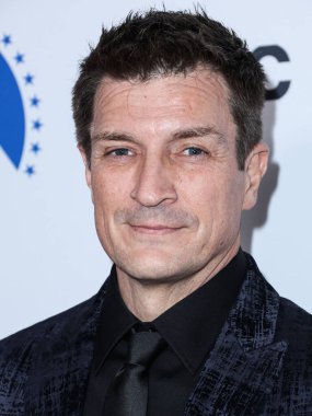 Kanadalı-Amerikalı aktör Nathan Fillion, 17 Kasım 2022 'de Beverly Hilton Oteli' nde düzenlenen 36. Yıllık Amerikan Sineması Ödülleri 'ne geldi..